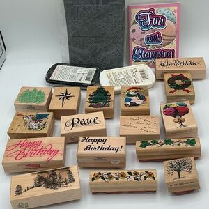 19 Assorted Rubber Stamps Set with inks and book, most are new.